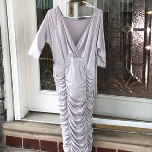 Gray drape dress fitted to the “T”